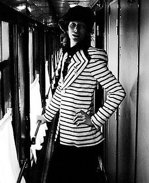 David Bowie photographed by Geoff MacCormack on the Trans-Siberian Express wearing a Freddie Buretti suit