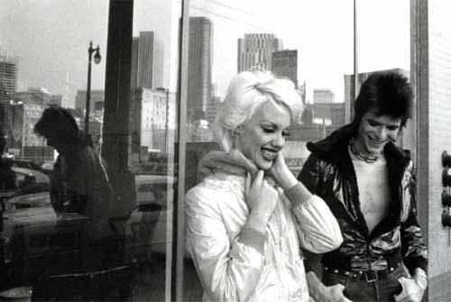 David Bowie & Cyrinda Foxe on the set of 'The Jean Genie' promo filmed by Mick Rock