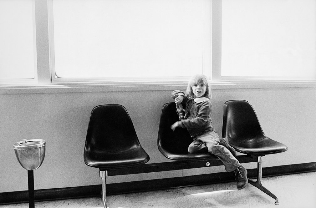 Bowie’s five-year-old son Zowie Duncan Jones passes time in an airport lounge by playing with his action figure toy between stops on the tour in 1976