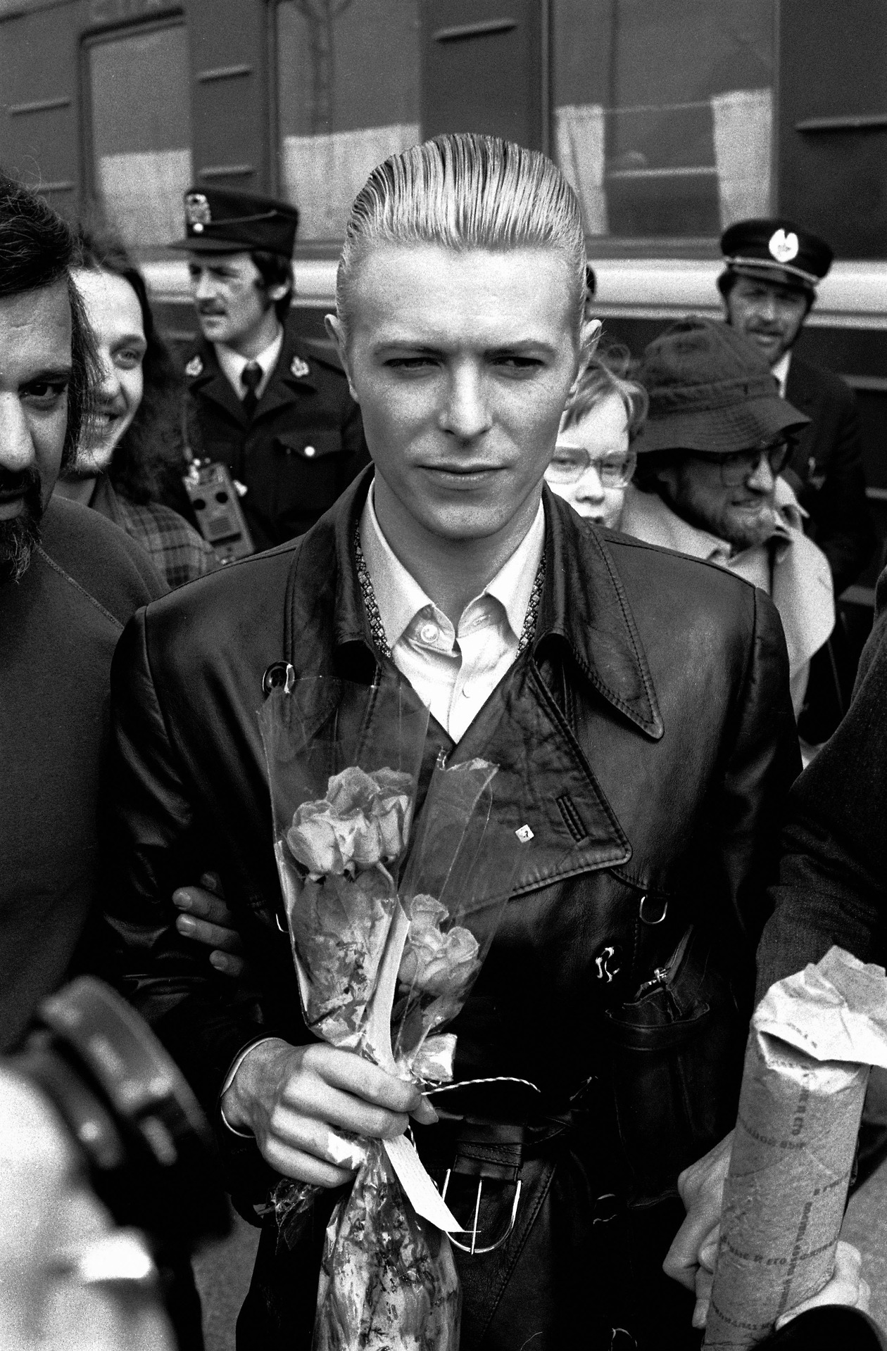 David Bowie accompanied by his chauffeur Tony Mascia at Helsinki station in 1976