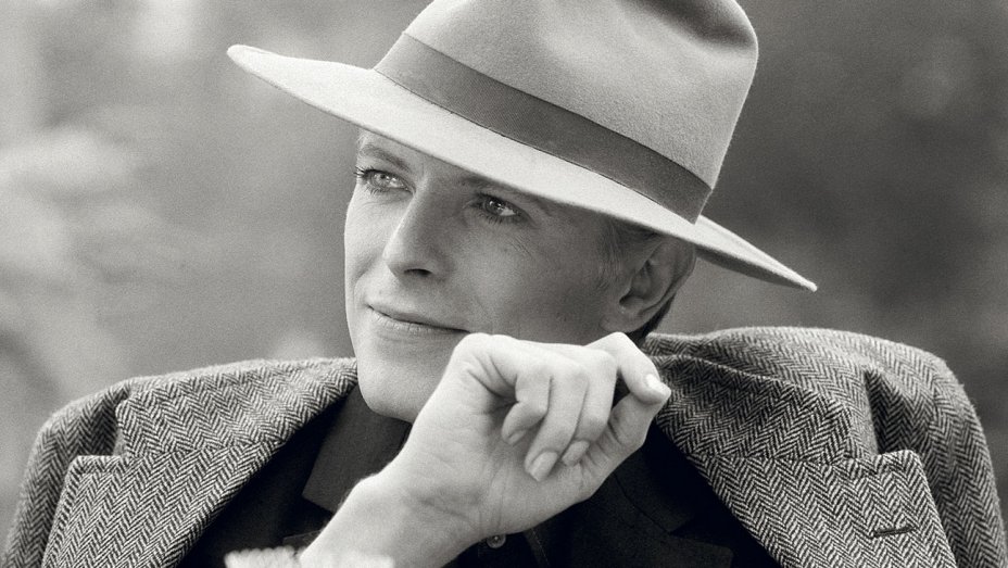 Singer David Bowie wearing a smart hat during the filming of 'The Man Who Fell To Earth' in Los Angeles, 1976.